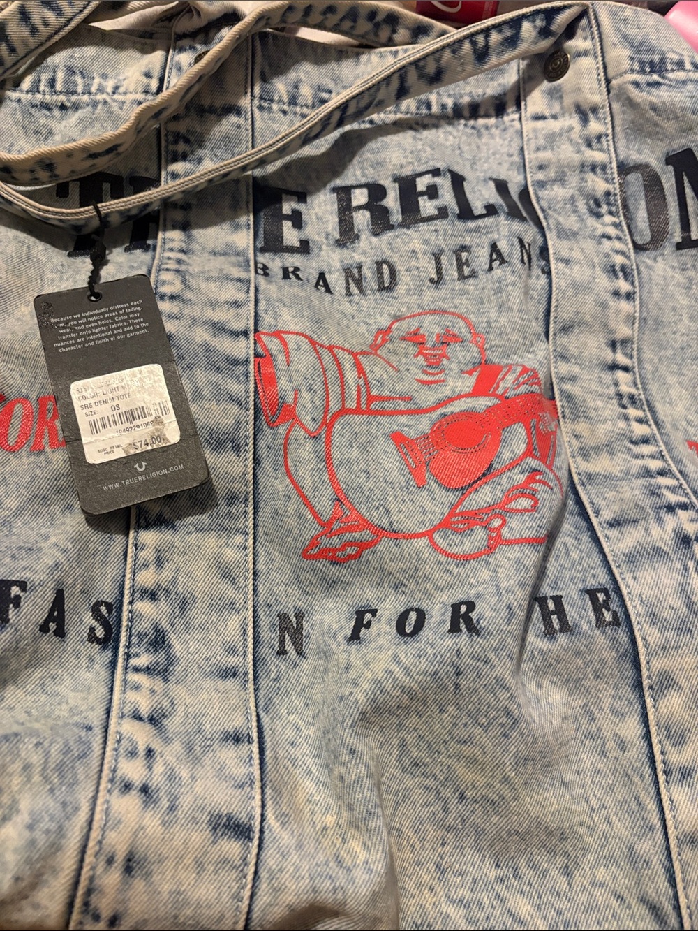 True Religion Men’s Light Wash Denim Jeans with Red Graphic